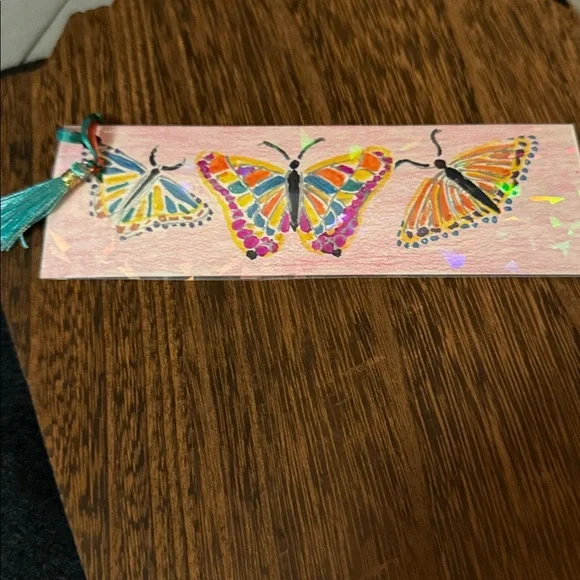 Hand-crafted Floral Bookmark with Teal Tassel
Holograph - Picture 2 of 2